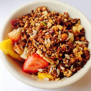 Granola bowl with pineapple and strawberry
