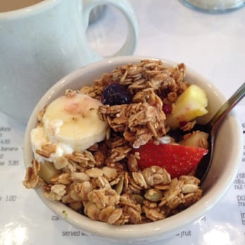 House-made granola bowl with banana, blueberries and fresh fruit