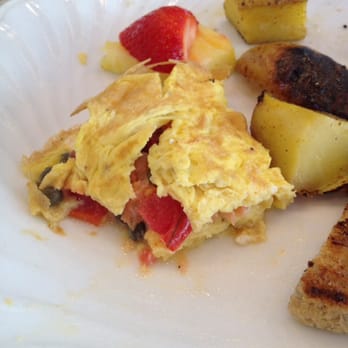 Scrambled eggs with feta, spinach and seasonal fruit at pHuel Cafe